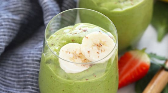 vegan green smoothie topped with bananas