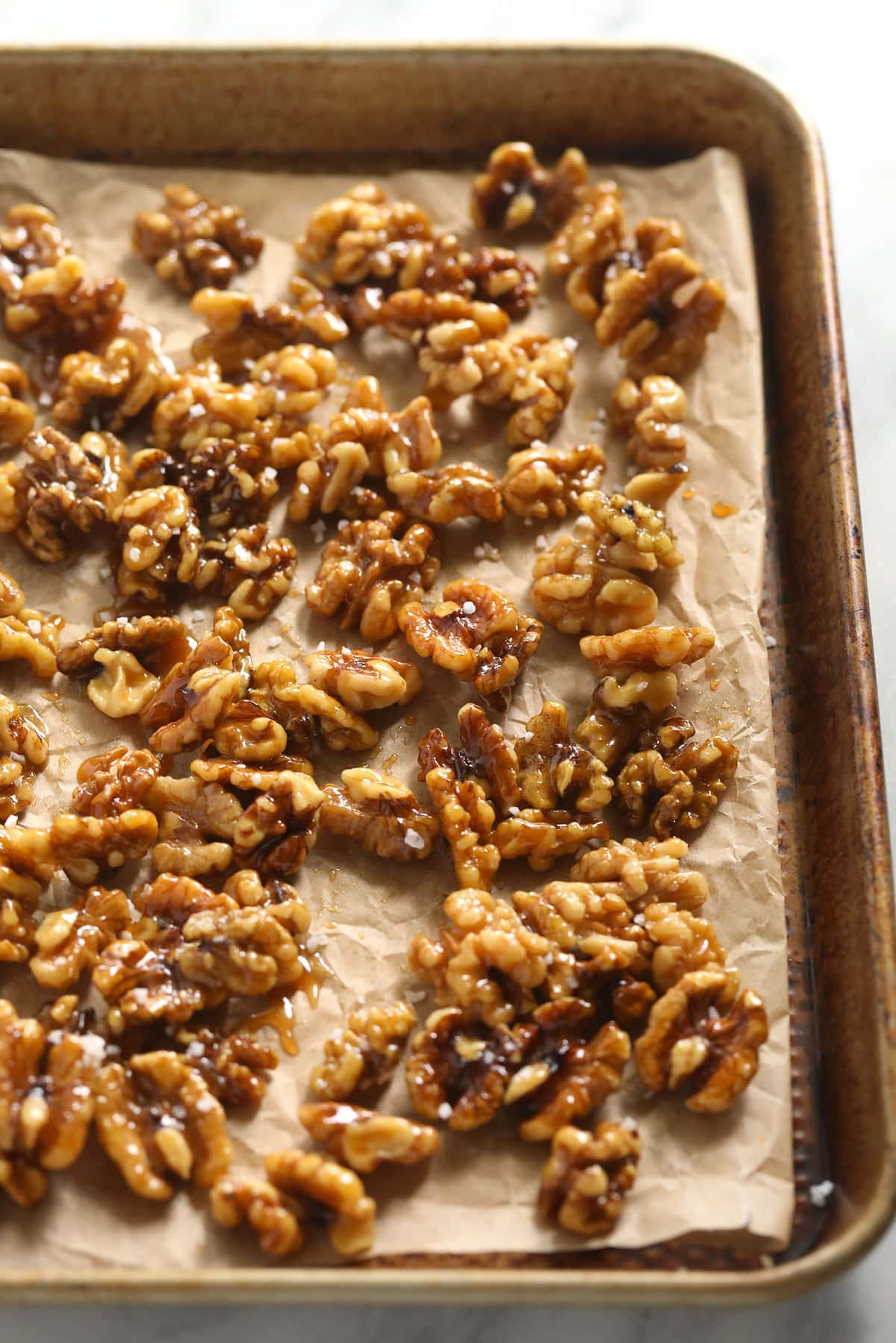 candied walnuts on sheet pan