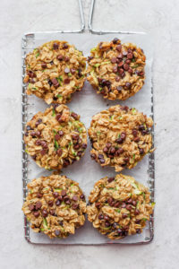 a tray of granola muffins on a baking sheet.