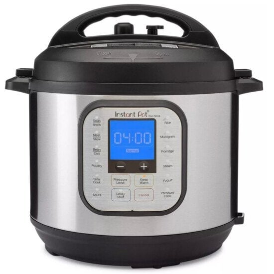 an electric pressure cooker on a white background.