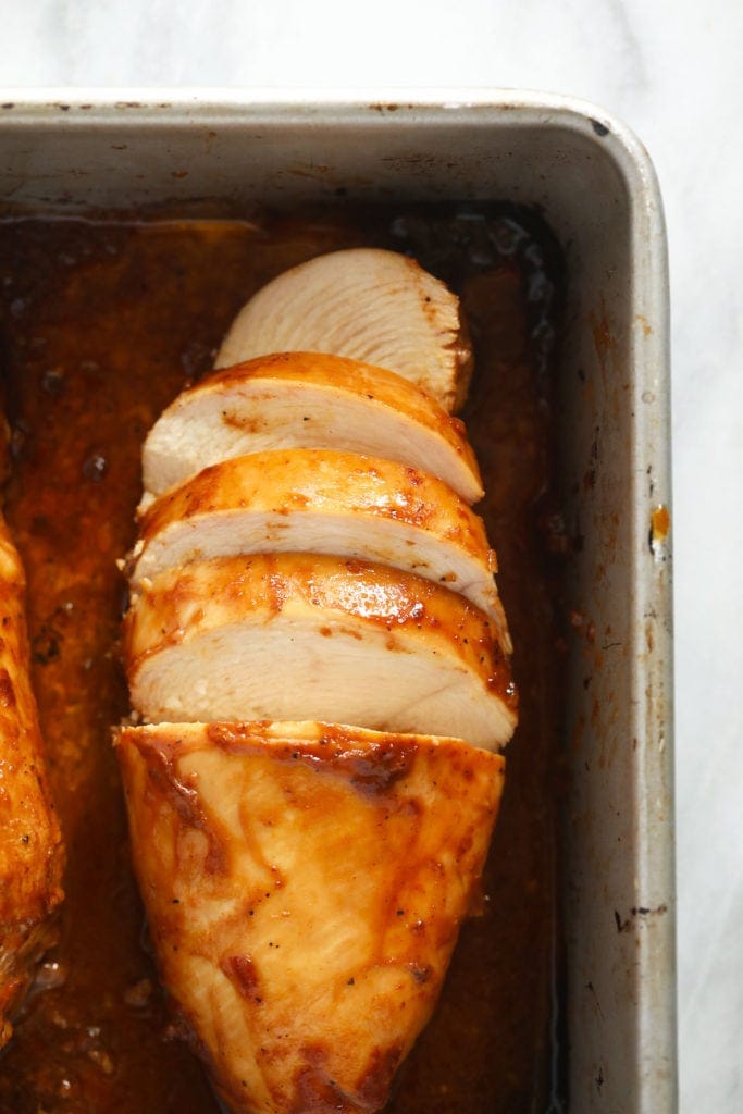 chicken breast that has just been baked in a delicious BBQ chicken marinade