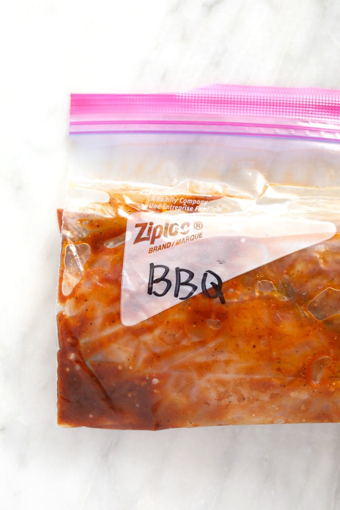 BBQ chicken marinating in a ziploc bag