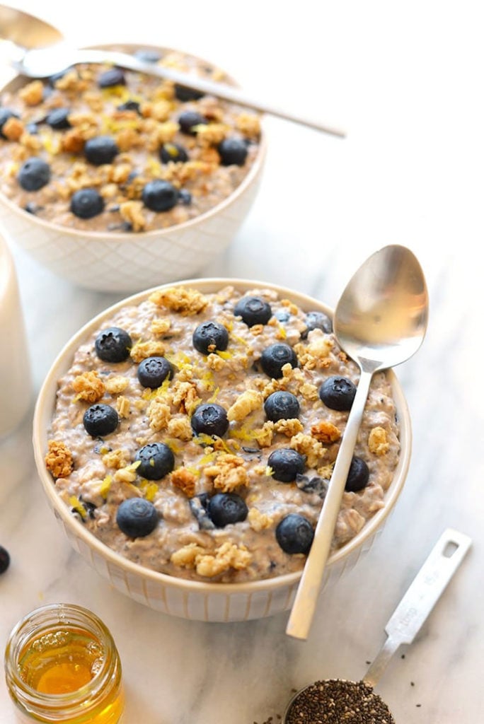 Make these Blueberry Overnight Oats so that you can have breakfast ready to go tomorrow morning! All the same flavors of a blueberry muffin but 100% better for you! blueberry overnight oats in bowl