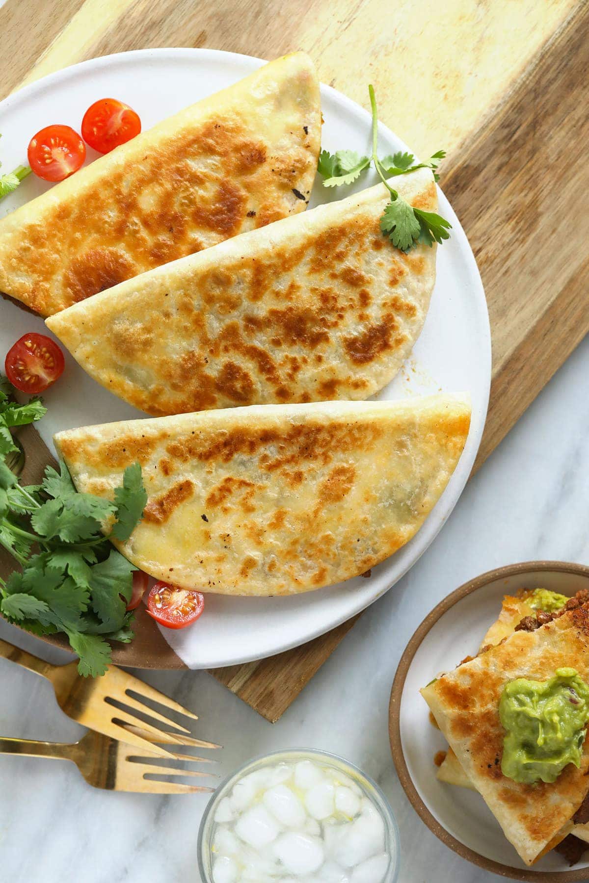 chicken quesadillas on a plate ready to be served