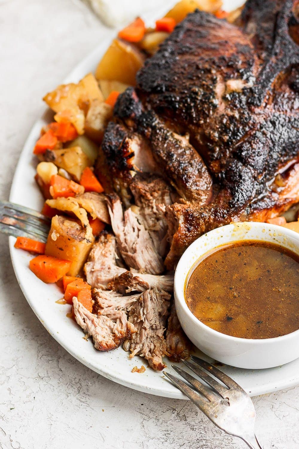 perfectly cooked pork roast on a serving platter