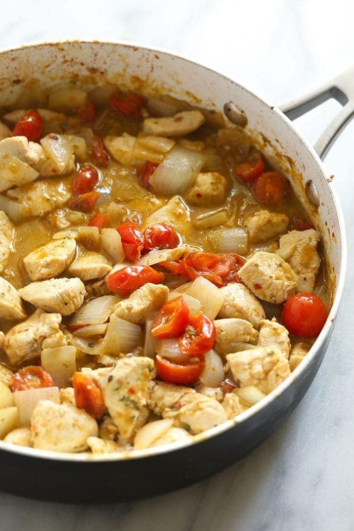 Pesto chicken pasta in a skillet pan. 