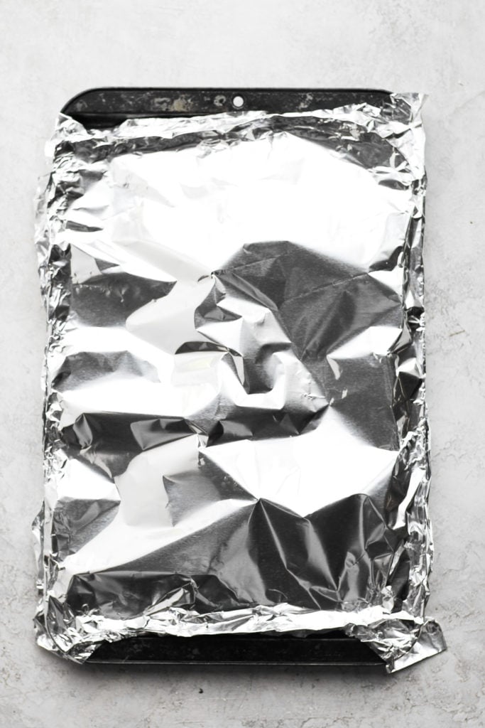 baked salmon covered in foil