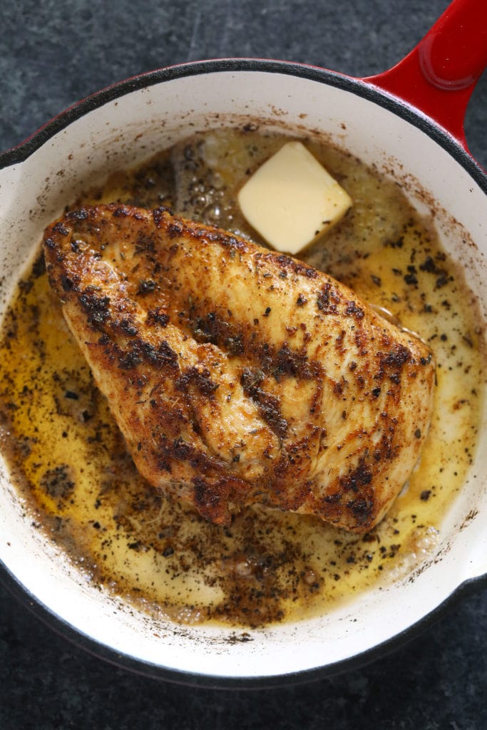 fried chicken breast in pan