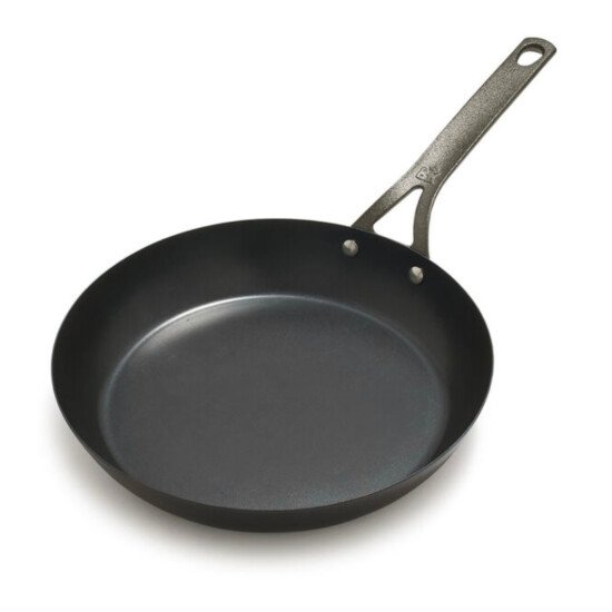 a black frying pan on a white background.