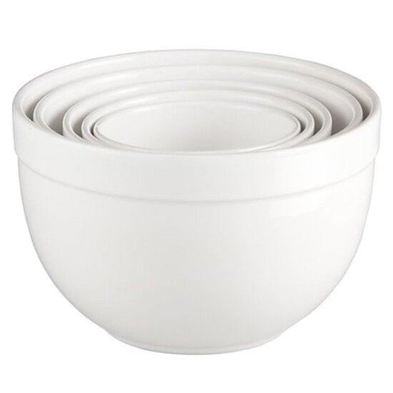a set of white mixing bowls on a white background.