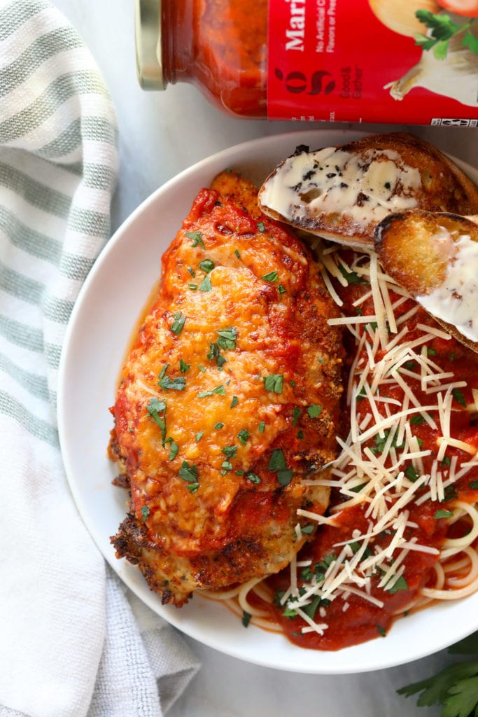 chicken parmesan on plate with pasta