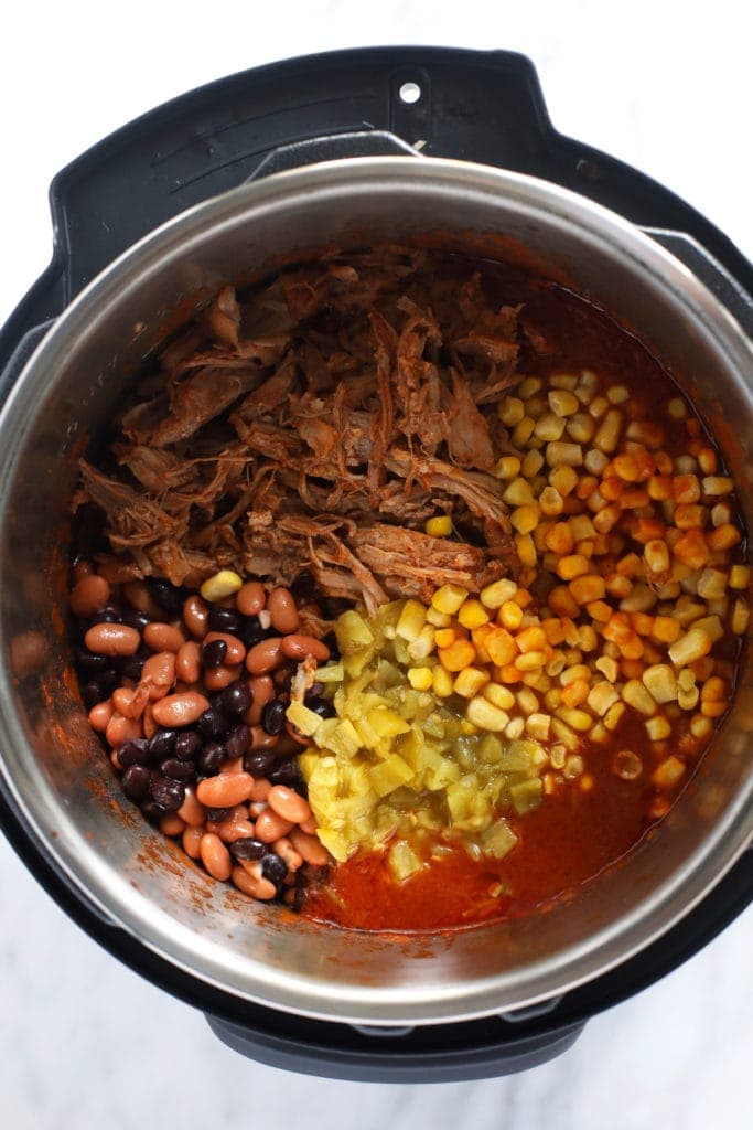 ingredients for pork chili instant pot in pressure cooker.