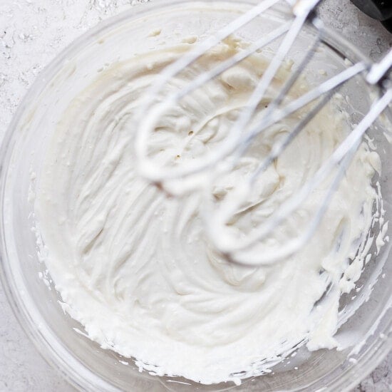 Cream cheese frosting in a bowl.