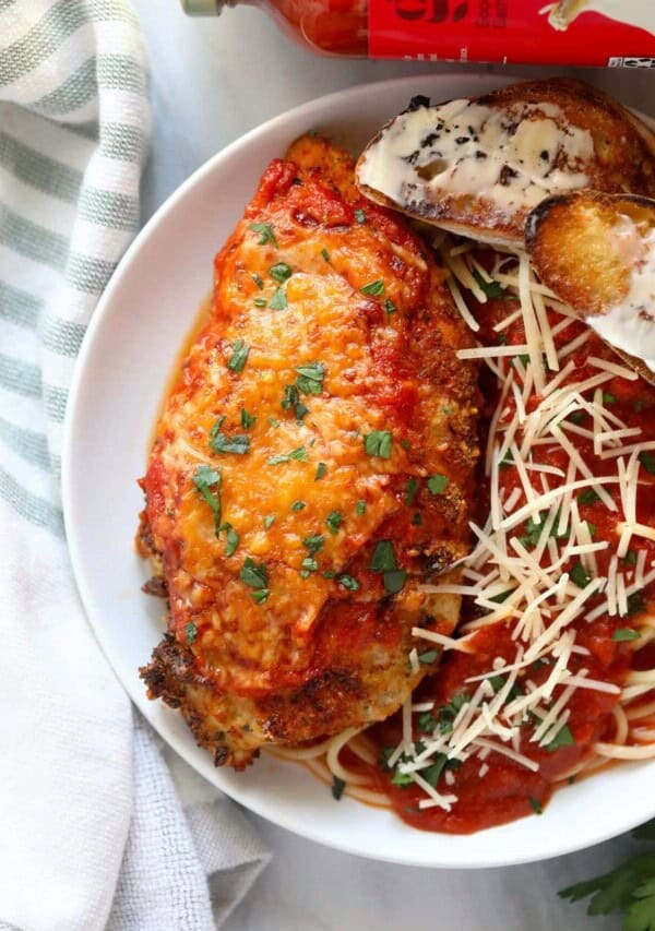 a plate of air fryer chicken parmesan