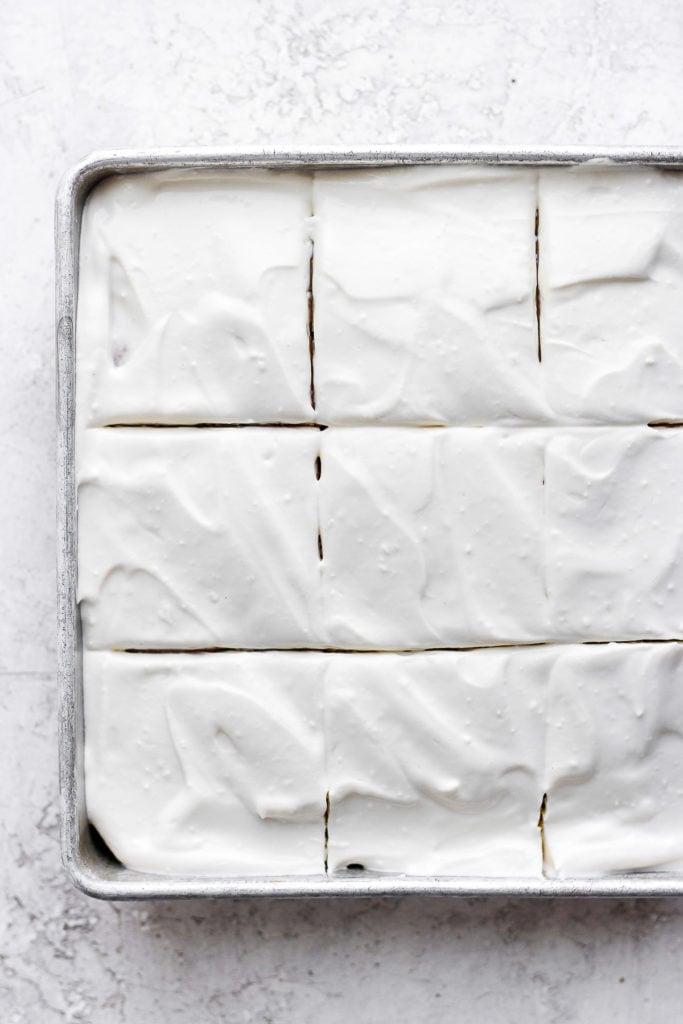 pumpkin sheet cake frosted with cream cheese frosting