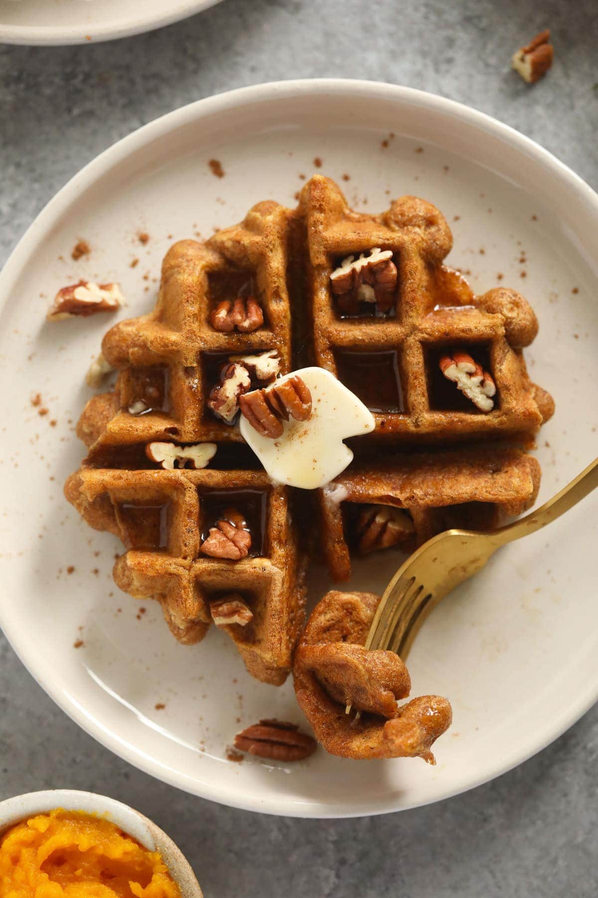 pumpkin waffle on plate with fork