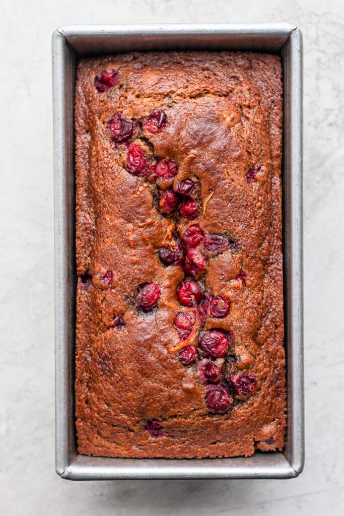 cranberry orange bread after its been baked in a loaf pan
