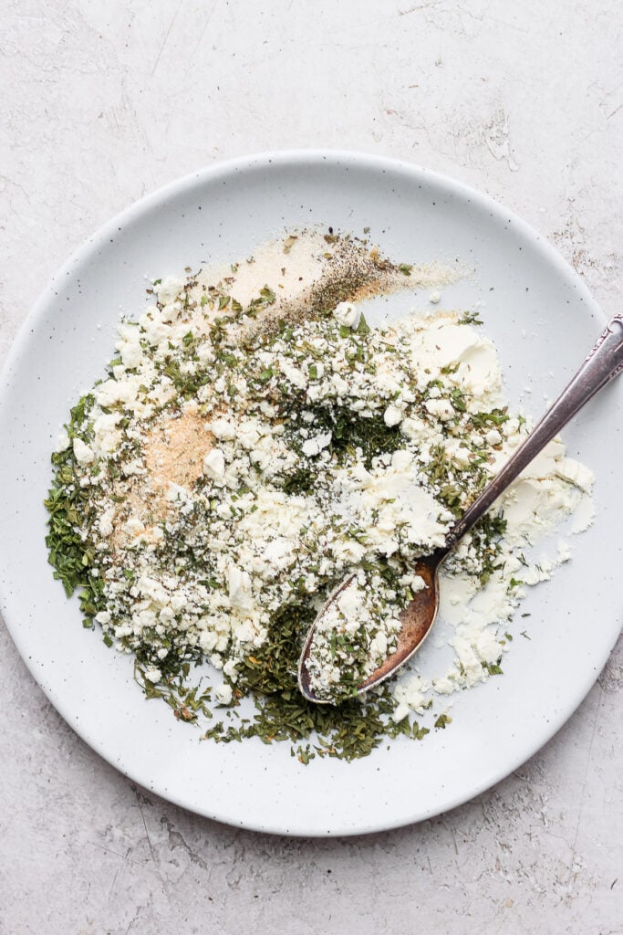 Ranch seasonings mixed on a plate.