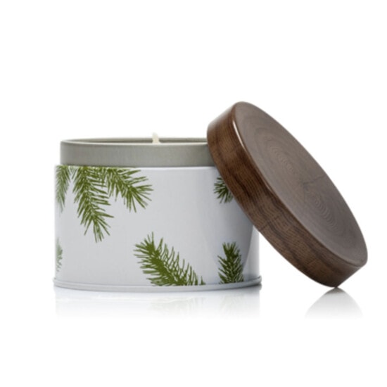 a white tin with a pine tree on it.