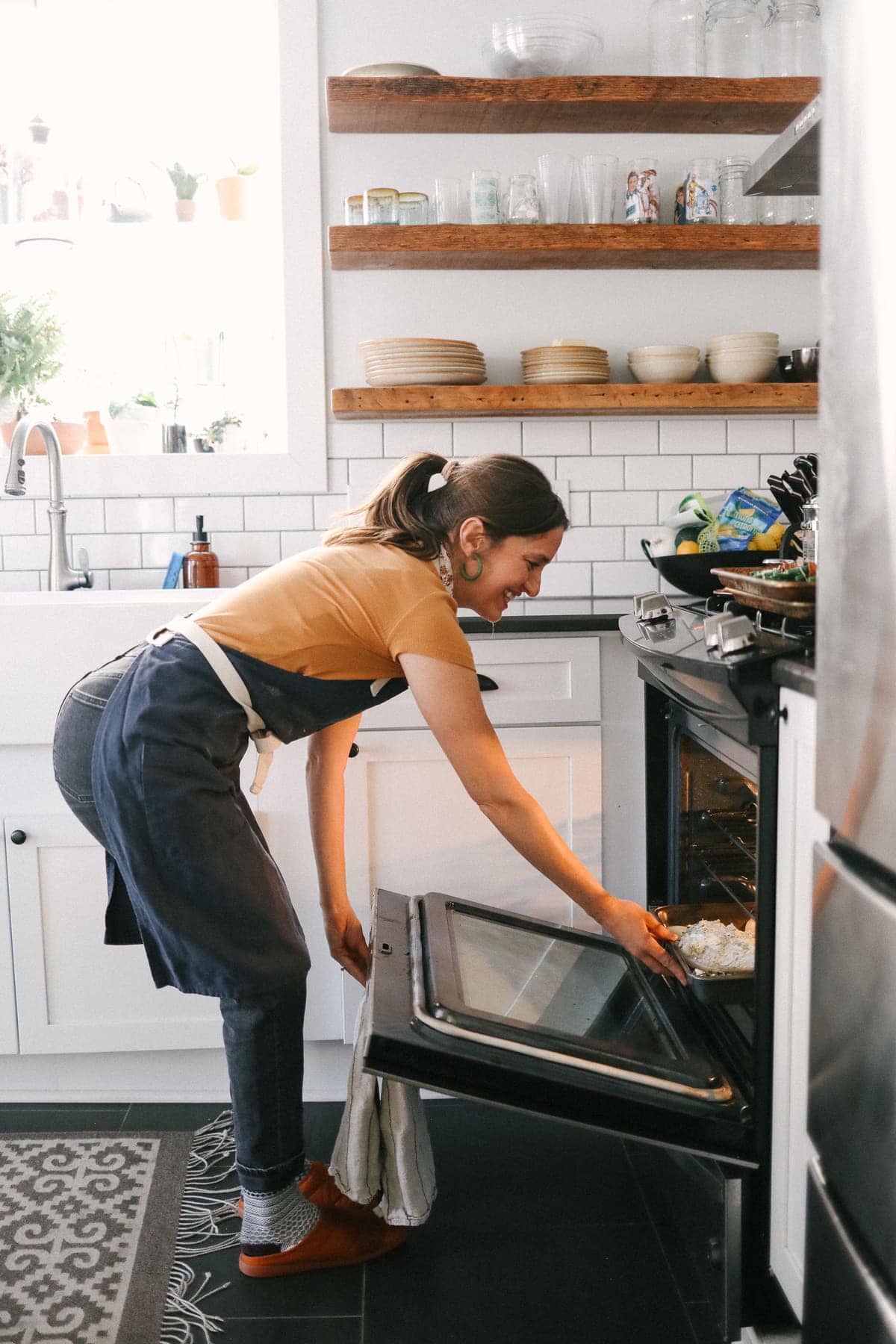 putting turkey in oven