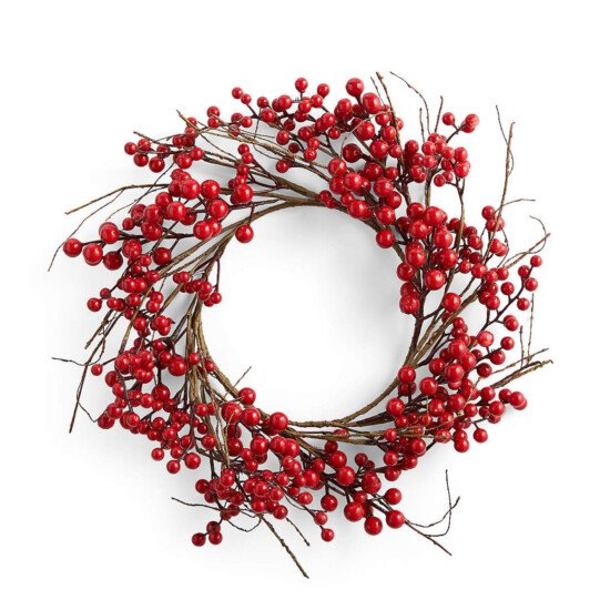 a red berry wreath on a white background.