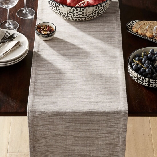 a table runner with fruit on it.