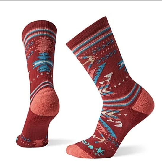 a pair of women's socks with an aztec pattern.