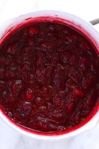 Unique cranberry sauce recipe served in a white bowl.