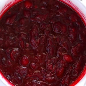 Unique cranberry sauce recipe served in a white bowl.
