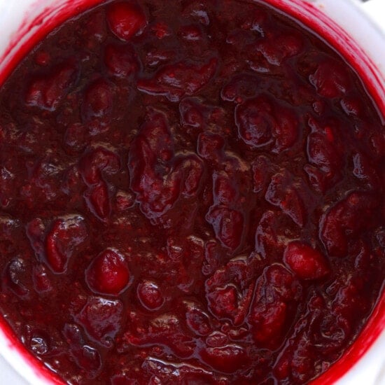 Unique cranberry sauce recipe served in a white bowl.
