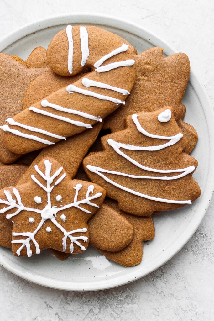 Decorated gingerbread cookies on a plate. 