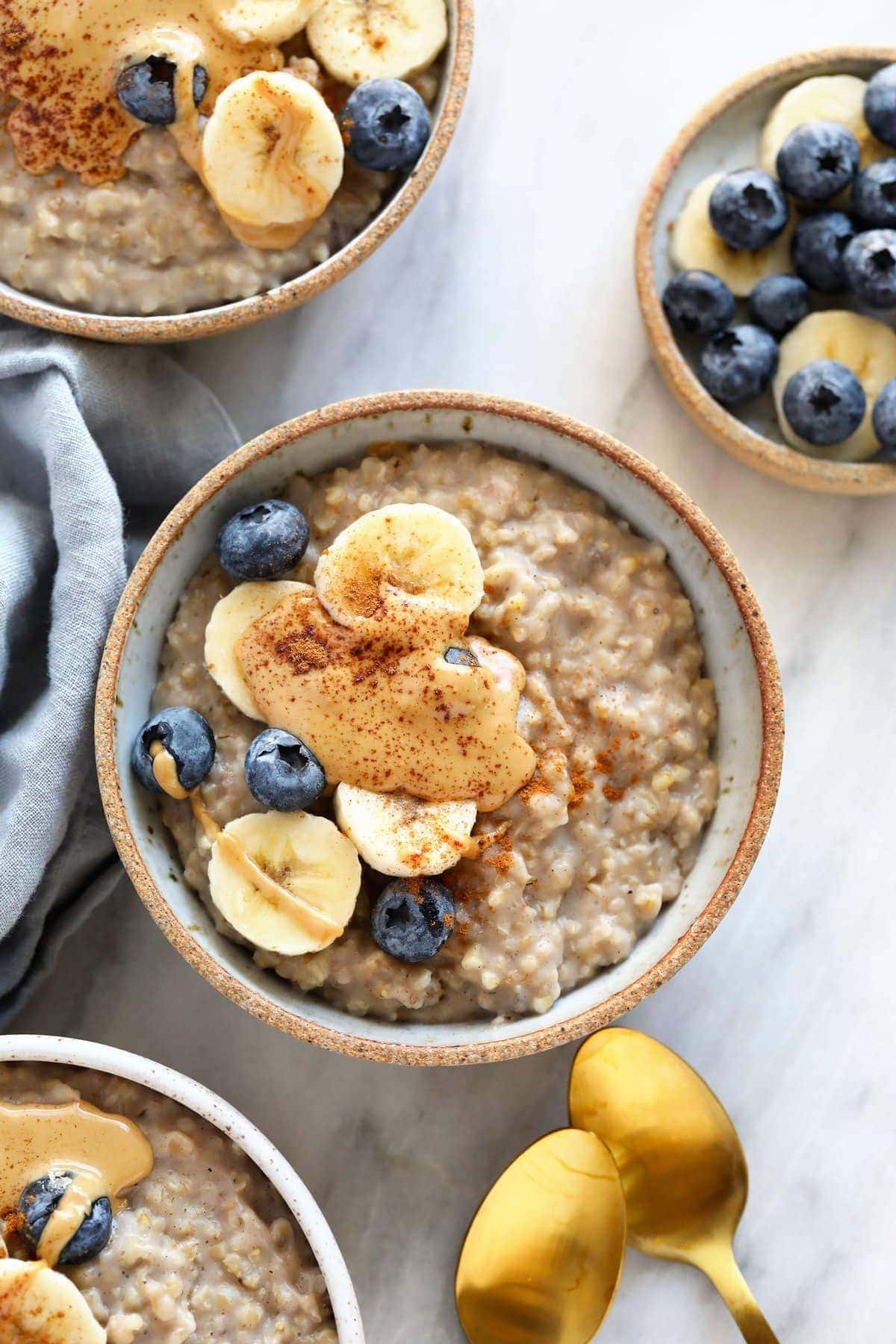 steel cut oats in bowl with banana and peanut butter