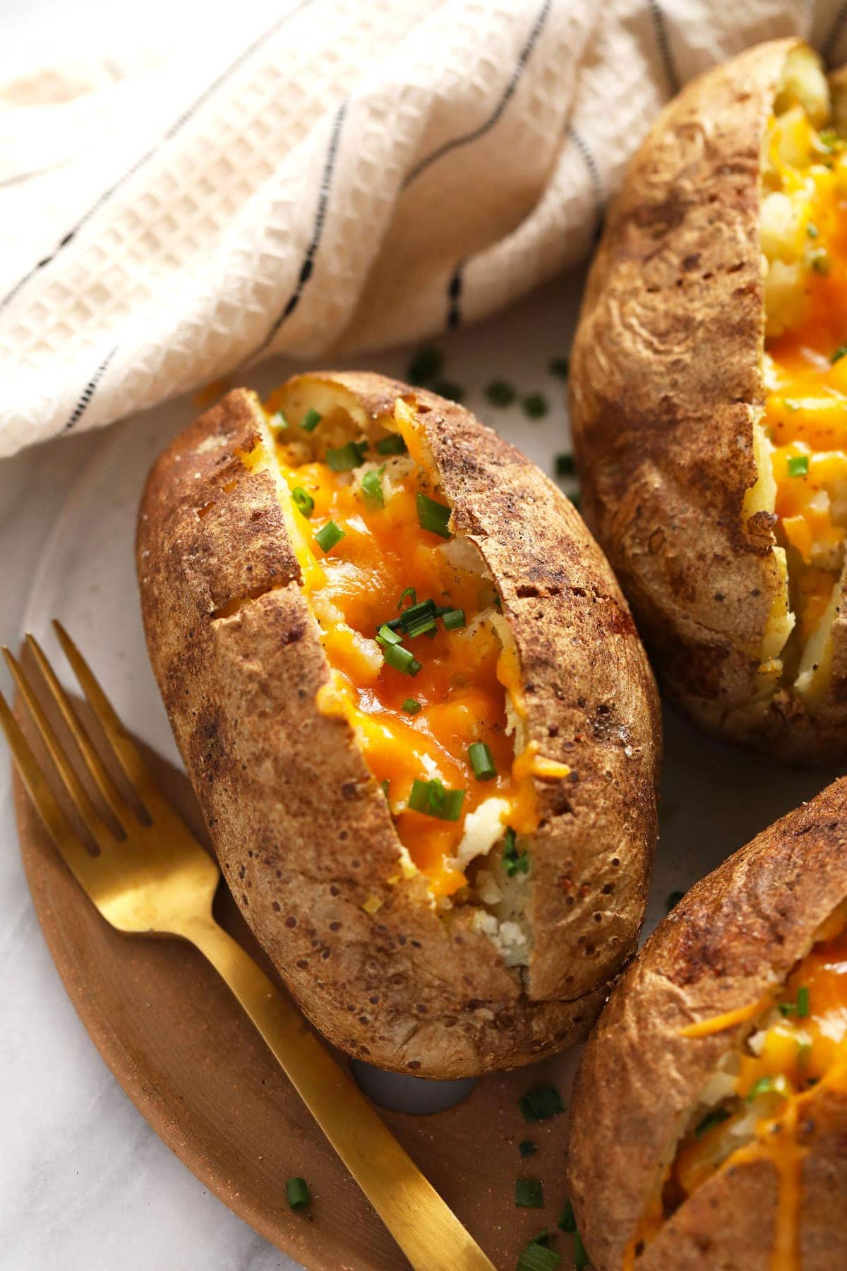 How to Bake a Potato (+topping ideas!) - Fit Foodie Finds