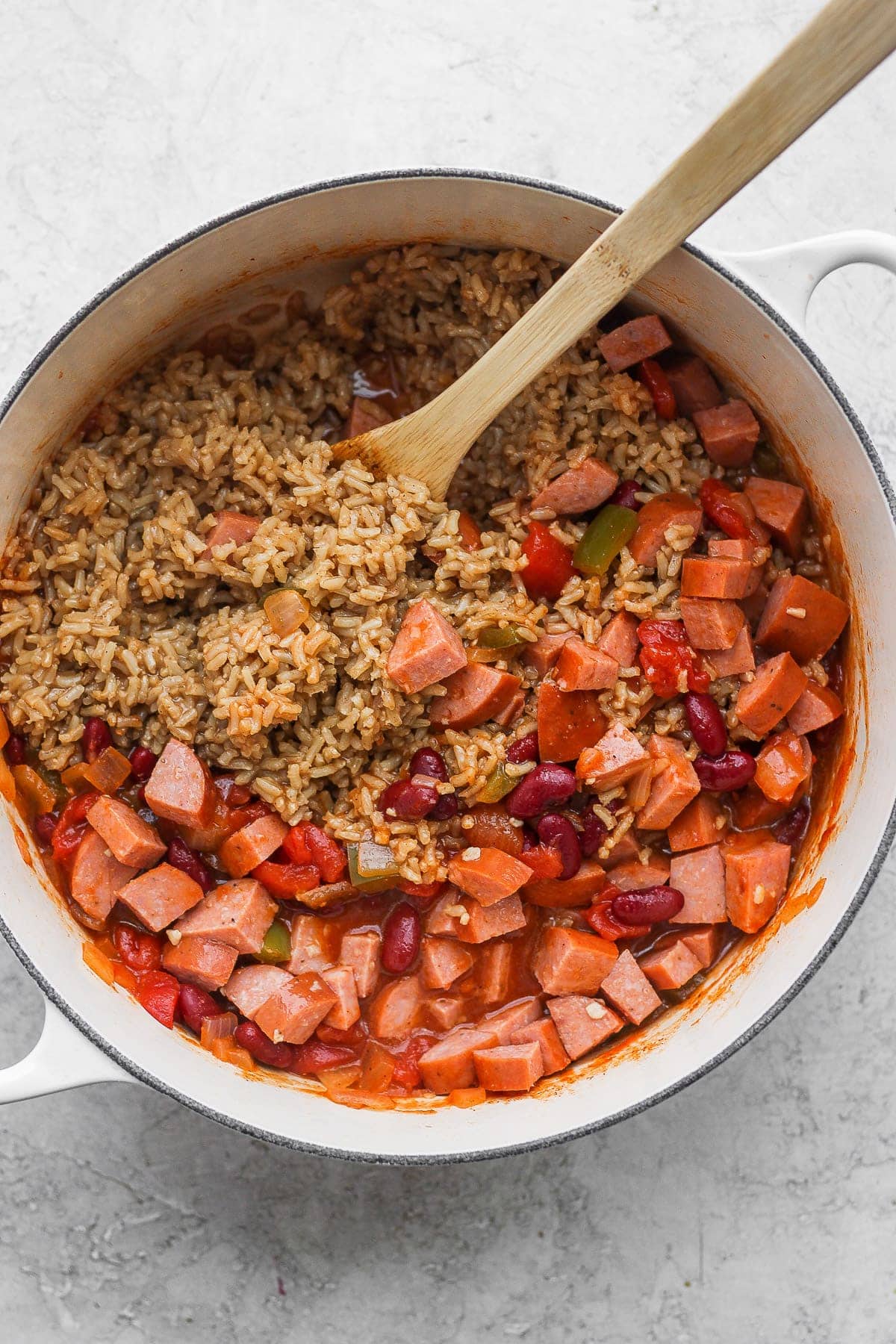 cooked red beans and rice ingredients in a stock pot, ready to be mixed together