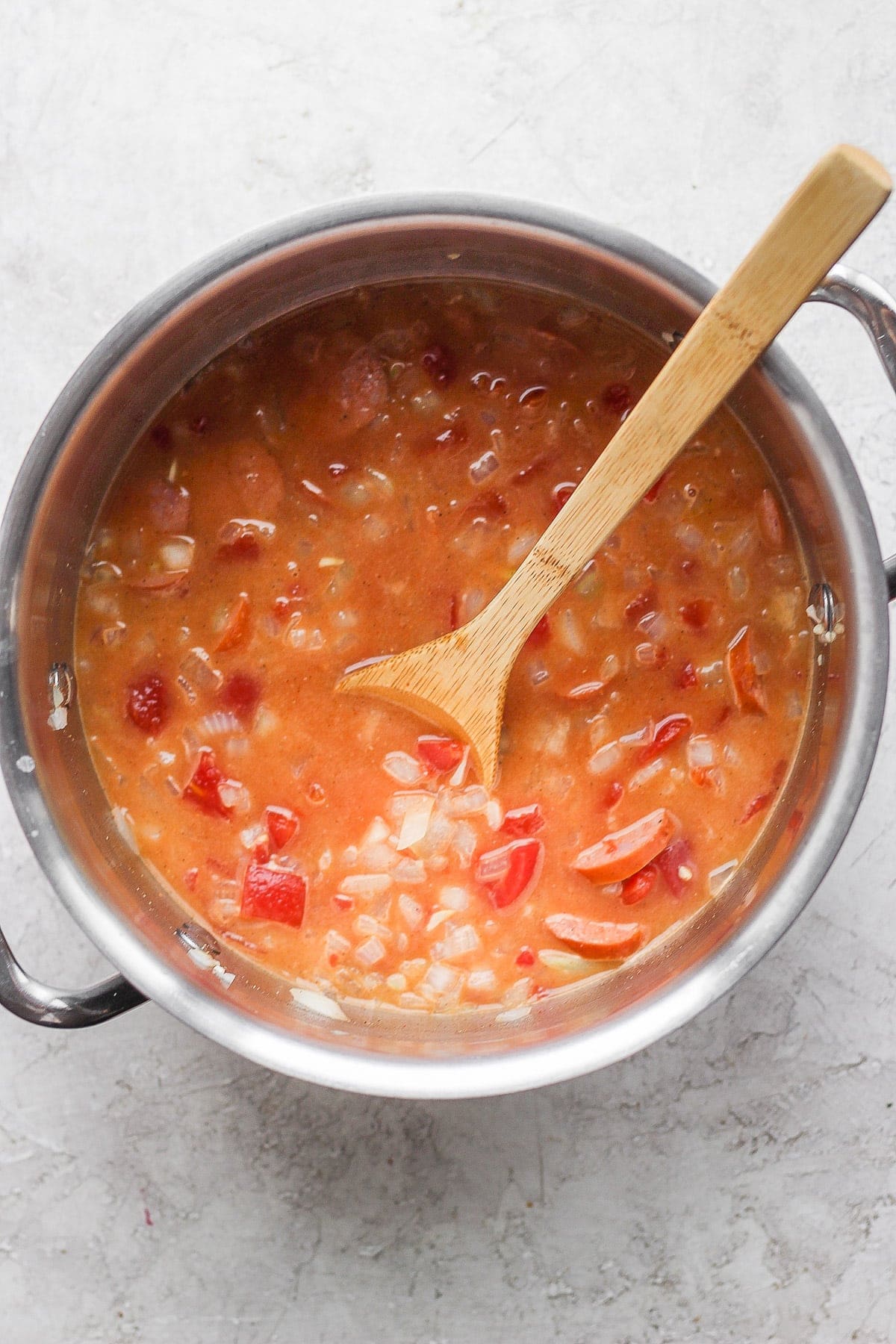 seafood boil broth in a stock pot