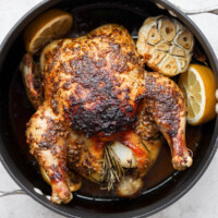whole roasted chicken in pan