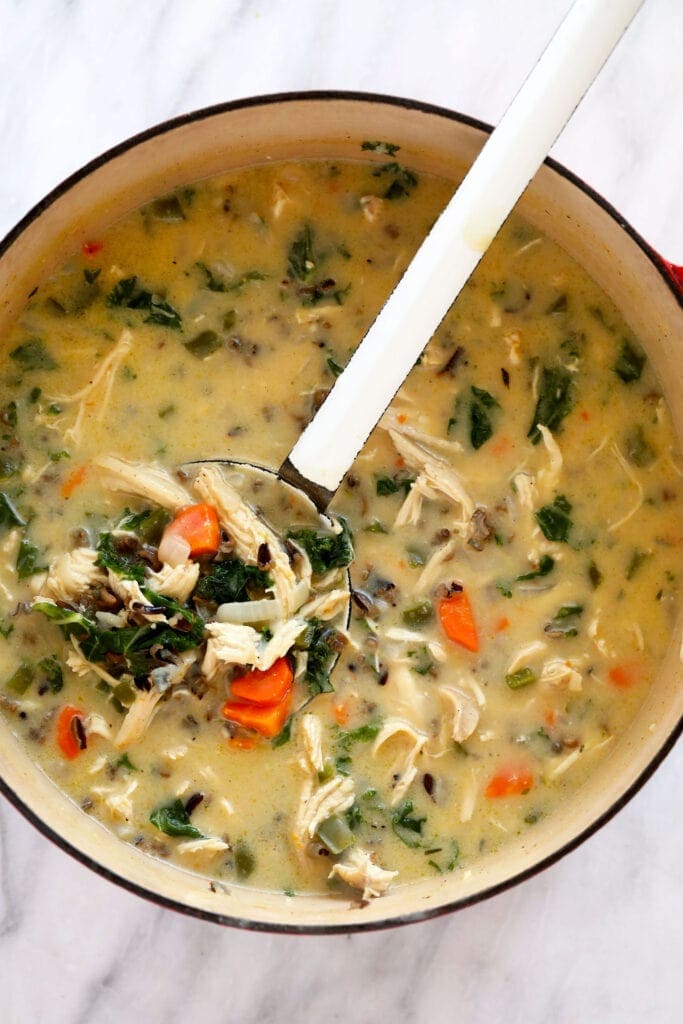 Chicken wild rice soup in a stock pot.