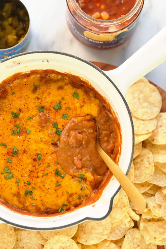 bean dip covered in melted cheese and baked to perfection