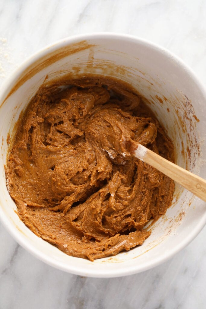 gingerbread cookie bar batter mixed together in a bowl