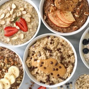 a variety of oatmeal bowls with different toppings.