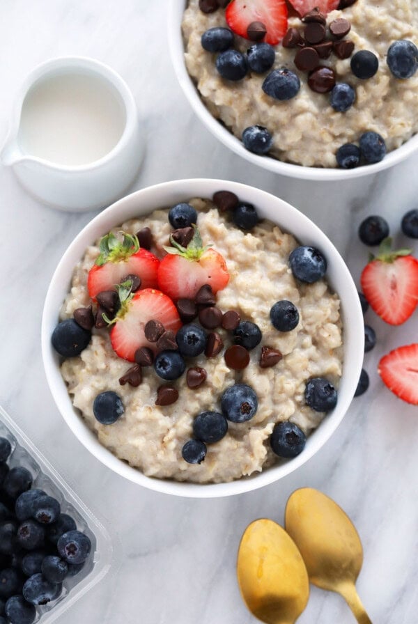 oatmeal in bowl with spoon and toppings