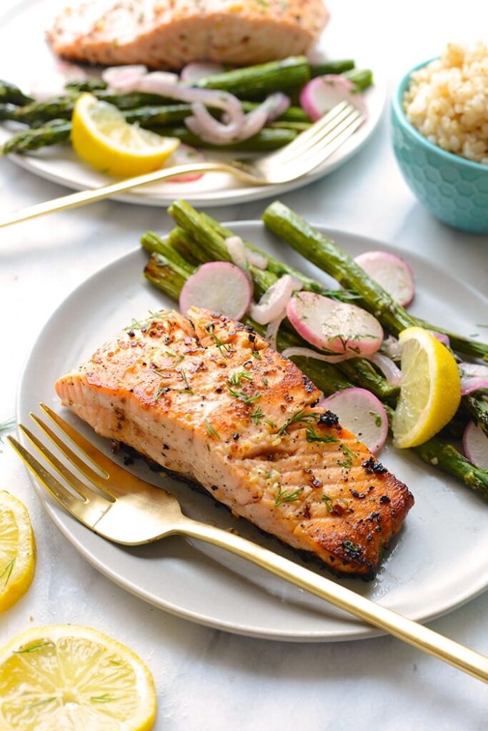 Make this Lemon Butter Pan Seared Salmon with 5 ingredients and in 20 minutes or less. Not only that, salmon is healthy and you can’t feel bad eating something this good. Enjoy! salmon on plate