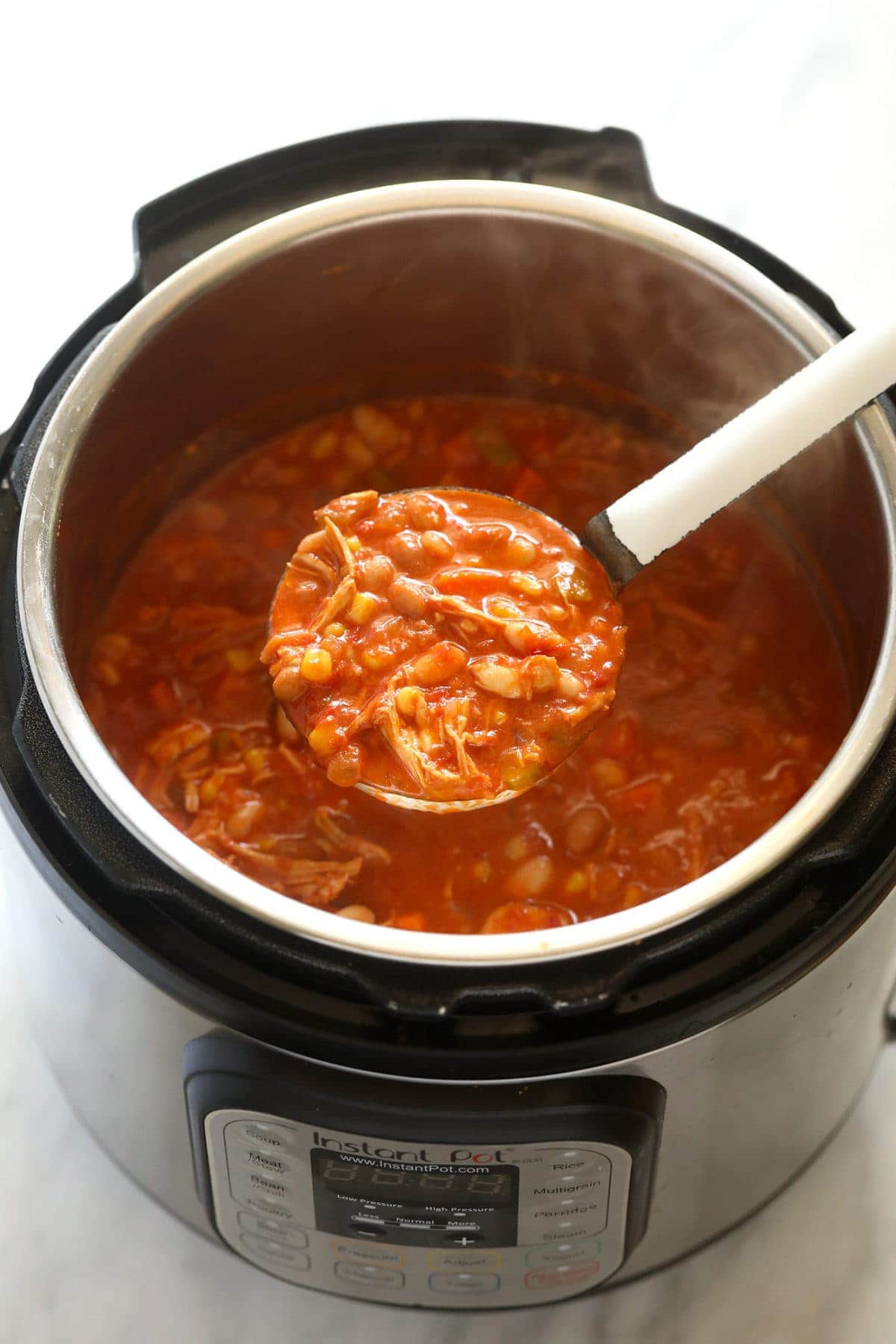 A ladle full of Instant Pot chili. 