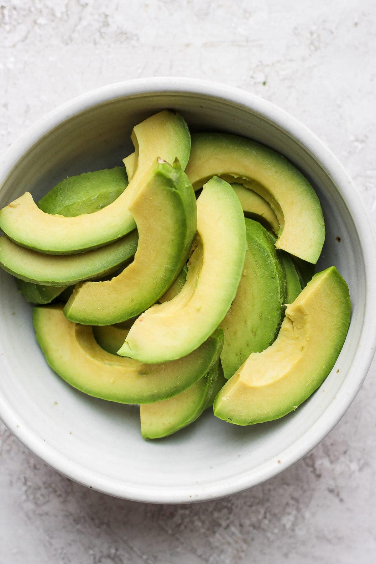 frozen avocado slices in a bowl