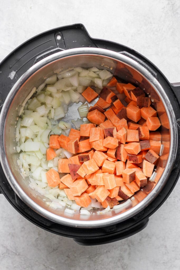 Sweet potatoes and onion in an Instant Pot. 