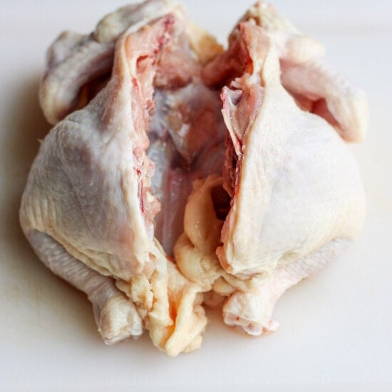 spine cut out of chicken.