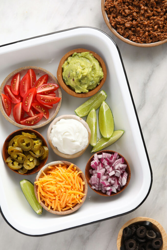 beef nachos toppings in container