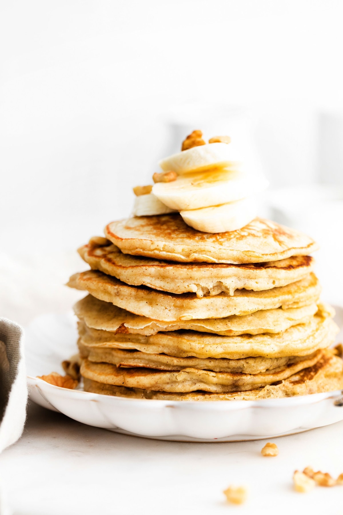 stack of pancakes with banana on top