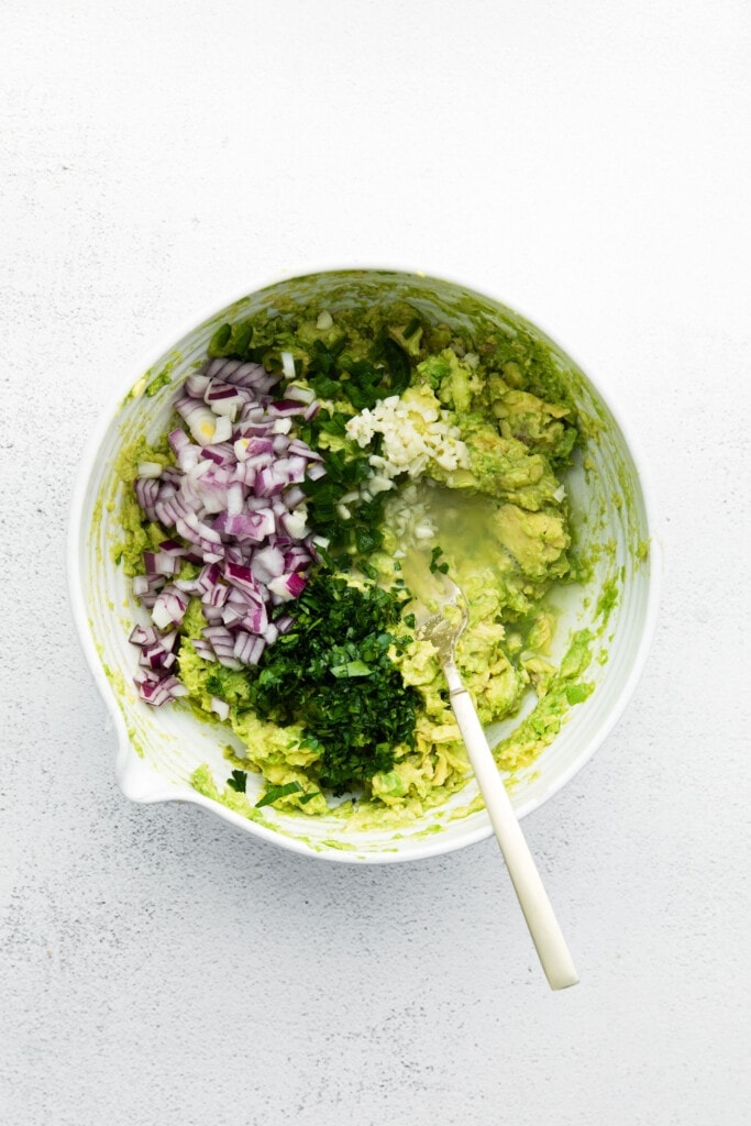 Guacamole ingredients in a bowl.