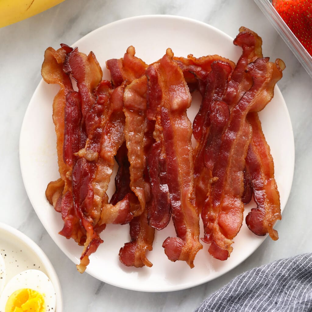 Bacon connected  a plate.